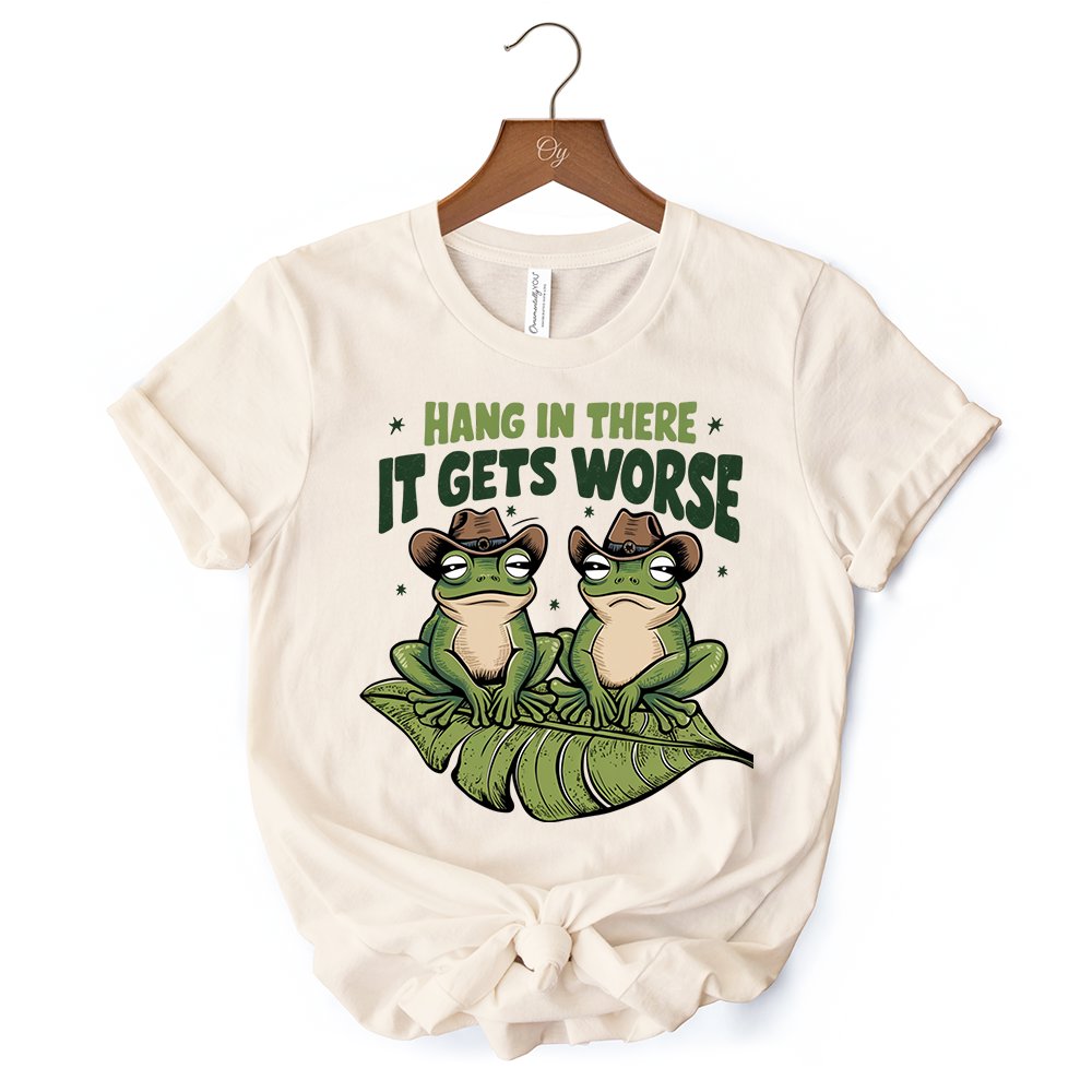 Hang In There It Gets Worse T-Shirt, White and Natural Funny Frog Tee with Dark Millennial Humor